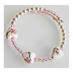 Memory wire armband 3 hartjes met roze kraaltjes, mini, stapelbaar