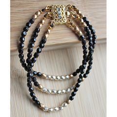 Armband mini kralen,3 rijen facetgeslepen 4mm kralen gitzwart, dof goud en parelmoer