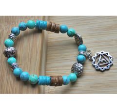Armband Boho, Turkoois groen met verzilverde kralen