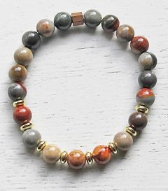 Armband 8mm Ocean jaspis kralen met goudkleurige hematiet. 