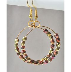 Hoepel oorbellen facetgeslepen koper- en goudkleur plated kralen