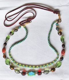 Dubbele ketting tsjechische facetgeslepen kralen aan suede koord