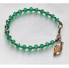 Armband 6x4mm facetgeslepen groene glaskralen, 20cm.