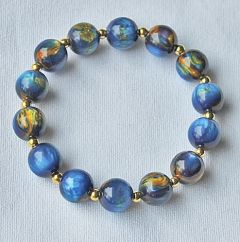 Armband 12mm blauw gevlamde resin kralen