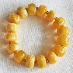 Armband imitatie edelsteen acryl kralen, geel met wit. 