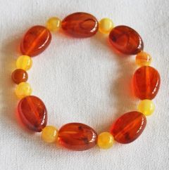 Armband bruine en gele acryl imitatie edelsteen kralen, 18cm.