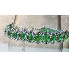 Armband groene facetgeslepen tsjechische glaskralen