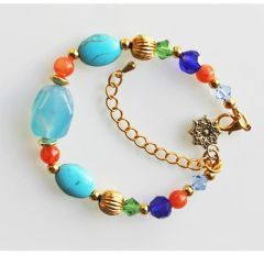 Zomerse armband, blauwe en goudkleurige kralen. 17cm+verlengketting