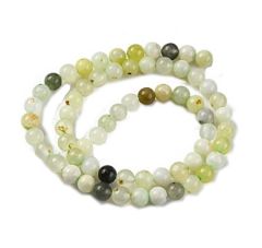 Snoer natuurlijke Jade 6mm in gemengde licht groenige kleuren.
