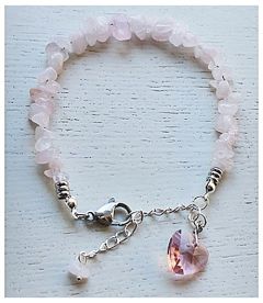 Armband Rozekwarts splitkralen met facetgeslepen roze hartje 
