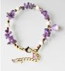 Armband Amethist splitkralen met schelpkralen en bedel