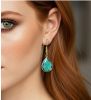 Druppel oorbellen, groene facetgeslepen kristal hanger