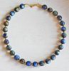Ketting blauw gevlamde resin 12mm kralen