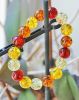 Armband imitatie barnsteen kralen 12mm, 20cm