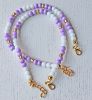 Armband 4mm lila en witte rocaille kralen