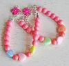 Kinder armband zacht oranje 8mm kralen met gekleurde hartjes