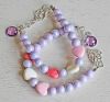 Kinder armband 8mm lila kralen met gekleurde hartjes