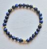 Armband 6mm blauwe tijgeroog kralen met goldplated hematiet, 19cm