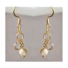 Oorbellen met imitatie parelhangertje en kristal kraaltje