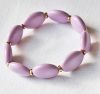 Armband grote ovalen kralen pastel lila kleur, 16-18cm