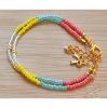 Armband 2 rijen 3mm Miyuki kralen guava, geel, blauw en transparant, 18cm.
