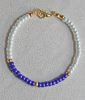 Armband 4mm  Miyuki kralen, donkerblauw, creme en goudkleur. 