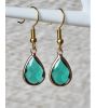 Druppel oorbellen met groene facetgeslepen kristal hanger