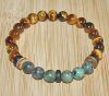 Armband 8mm Tijgeroog kralen met Afrikaanse turkoois kralen, 20cm.