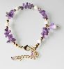 Armband Amethist splitkralen met schelpkralen en bedel