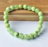Armband 8mm lichtgroene jadekralen, 18-19cm.