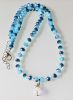 Ketting facetgeslepen blauwe kralen met druppel kristal hanger