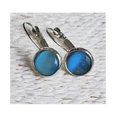 Set sluitbare oorbellen Cat eye blauw 10mm
