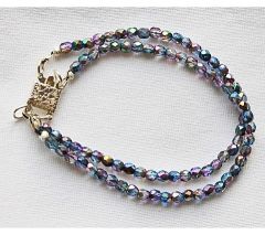 Armband 2-rijen facetgeslepen 4mm magic blauw kralen. 20cm.