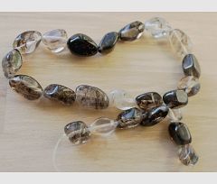 Kralen Rutilated kwarts. 14~20x8~12mm. Per stuk.