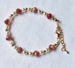 Armband rood gevlamde donut kralen, 20cm.