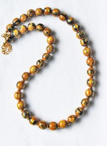 Ketting burned orange gevlamde resin 12mm kralen, 52cm