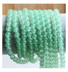 Snoer Jade zacht groen, iets transparant 6mm, 50 stuks.