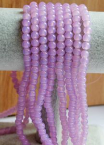 Snoer ronde glaskralen roze-lila 6mm. 50 stuks.