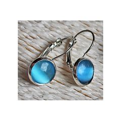 Set sluitbare oorbellen Cat eye lichtblauw 10mm