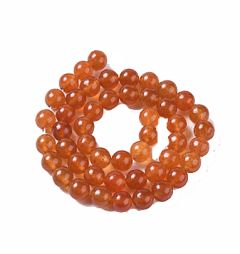 Snoer jade 6mm oranje-bruin, gemiddeld 50 kralen