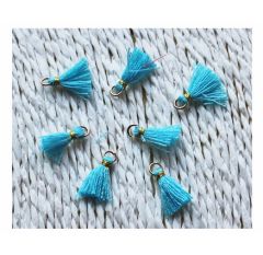 Kwastje of tassel zacht blauw 15mm met goudkleurig ringetje.