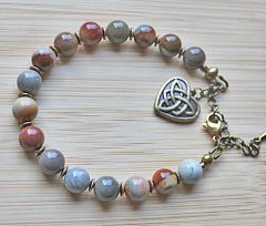 Armband 8mm Ocean Jaspis kralen met bronzen tussenkraaltjes