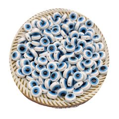 Acryl kralen Boze oog wit-blauw 6x2mm plat. Per 25 stuks.