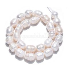 Zakje zoetwater rijst parelkralen, 7-10x 7-8mm. Per 10 stuks.
