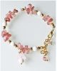 Armband splitkralen Aardbeien kwarts met schelpkralen