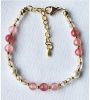 Armband 6mm roze jade met schelp pareltjes
