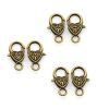 Sluiting antiek brons hartvorm, 25x14x6mm. Per stuk.