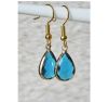Druppel oorbellen met facetgeslepen blauwe kristal glas hangers
