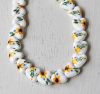 Zonnebloem hartje, 15x15x7mm. Per 2 stuks.