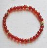 Armband 6mm rode agaatkralen met goudplated hematiet